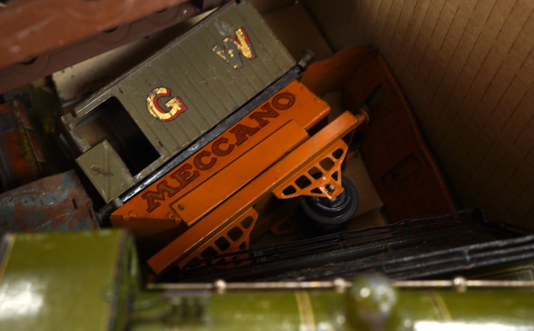 A Bing for Bassett Lowke 0 gauge tinplate clockwork LNER Ivatt 4-4-0 tender locomotive, 4390, together with an early Hornby clockwork 0-4-0, 2710, in GNR green livery with Meccano Ltd roundels to locomotive splasher and